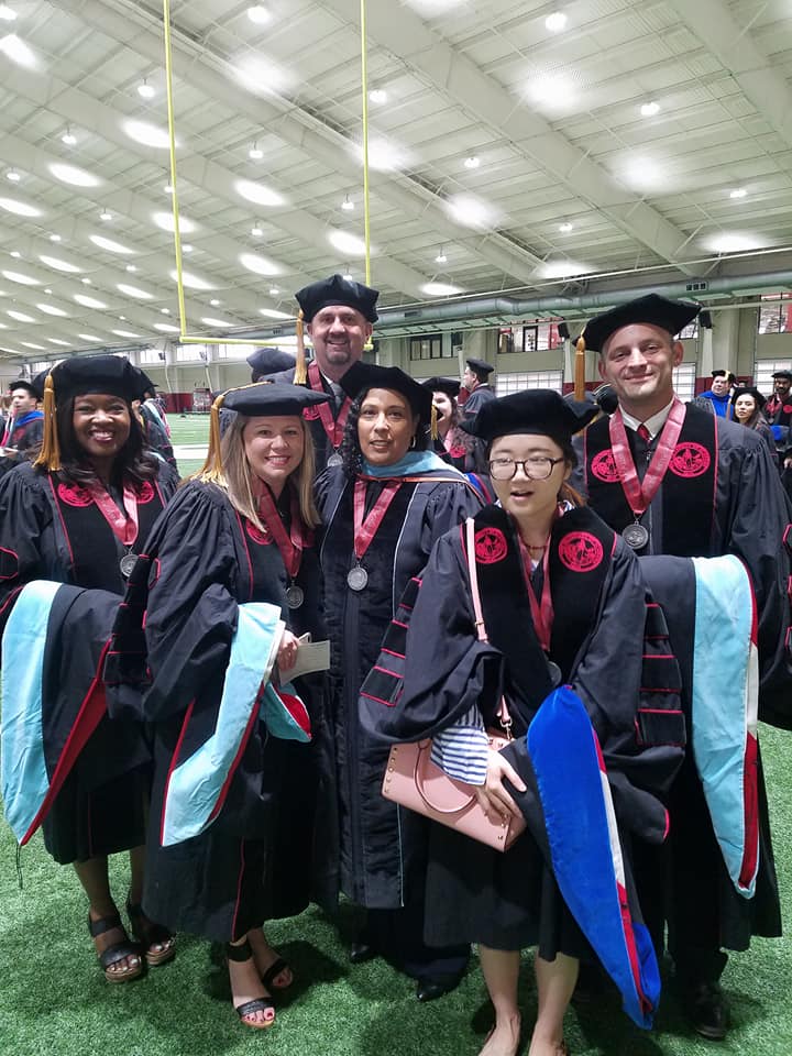 Dr. Mitchell & 5 graduates